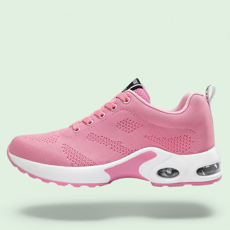 Minimalistiske kvinnesneakers i pustende materiale, med sikker snøring og lett design for optimal komfort.