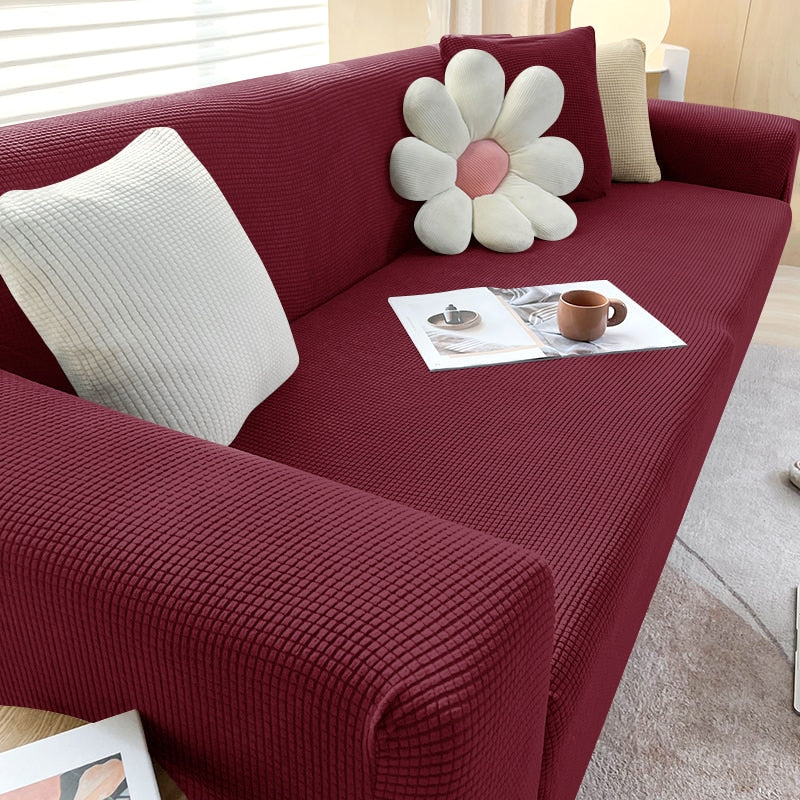 Elastisk sofatrekk i elegant farge. Gir sofaen nytt liv, optimal beskyttelse og er enkelt å rengjøre hjemme.