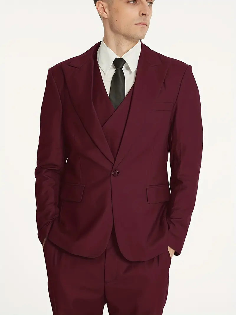 Klassisk herredressett med stilig blazer, matchende vest og elegante dressbukser for formell bruk.