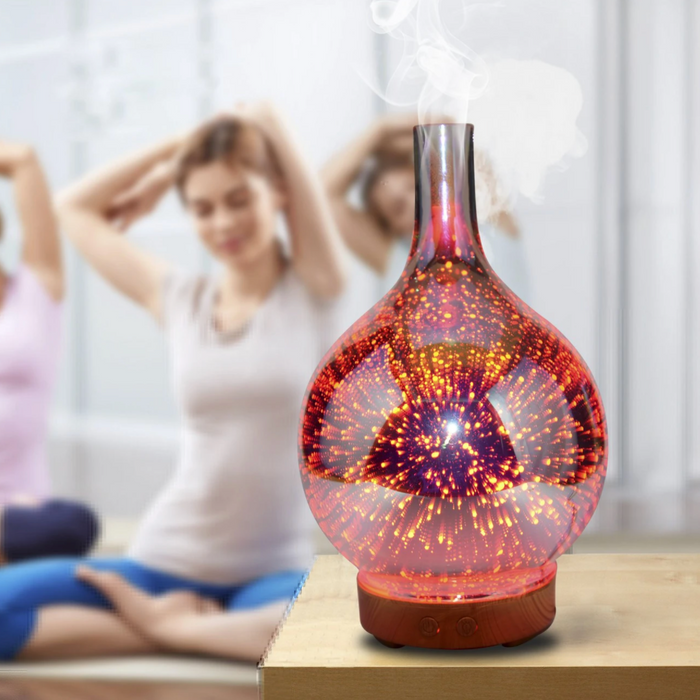 Aromaterapi diffusor i 3D glassvase med LED lys, skaper avslappende atmosfære for velvære.