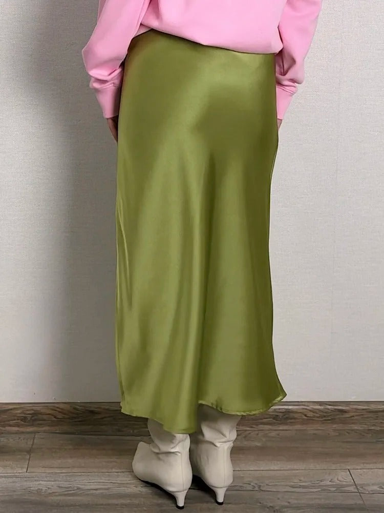 Allsidig A-linje skjørt for kvinner; ensfarget, elegant og lett å style for vår og sommer.