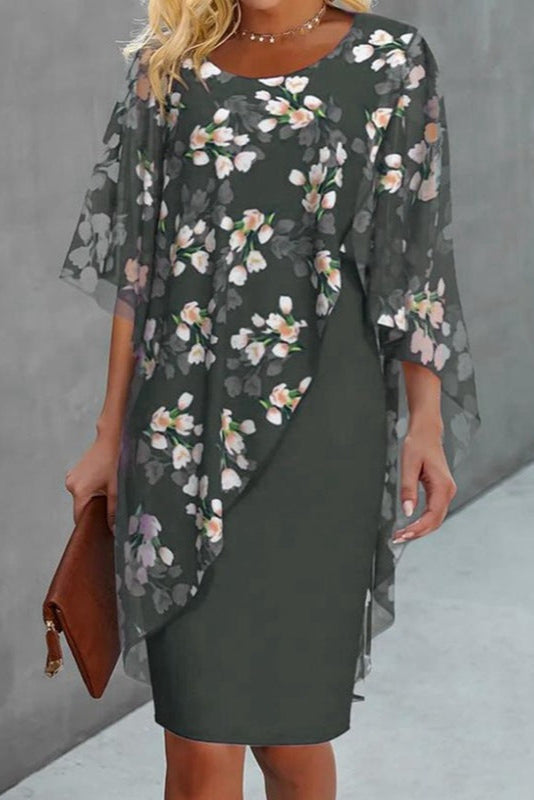 Nydelig blomsterkjole i midi-lengde for kvinner, en trendy og behagelig kjole med tidløs floral design.