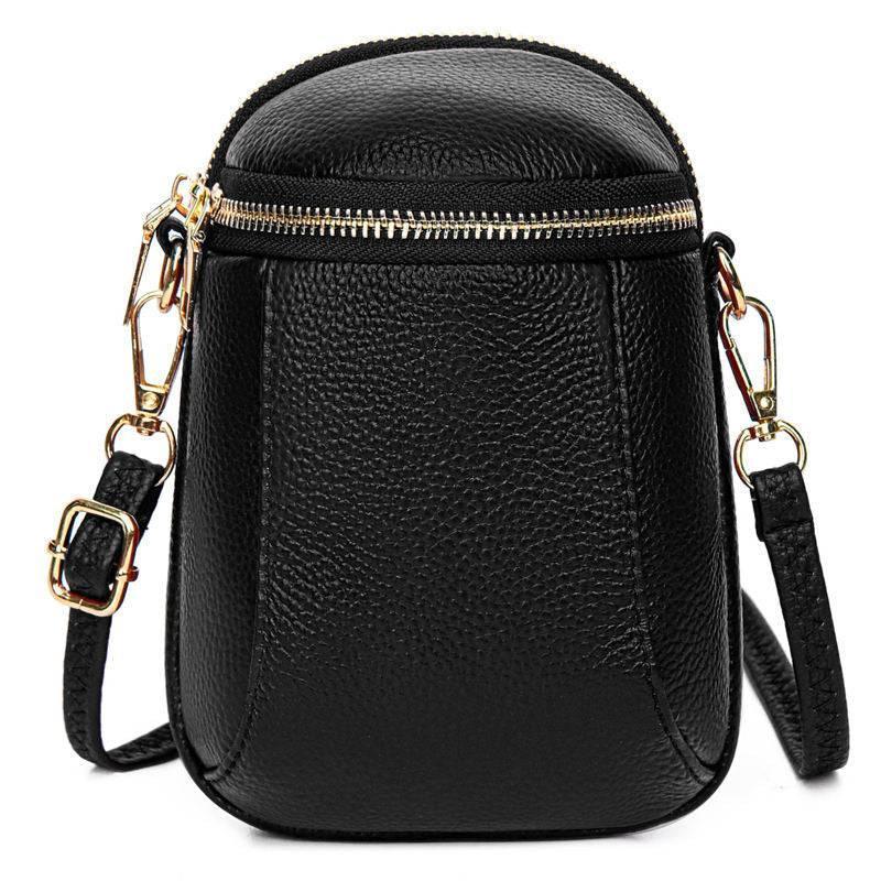Elegant dame crossbody veske i vegansk lær. Perfekt for hverdagsbruk og moderne mote.