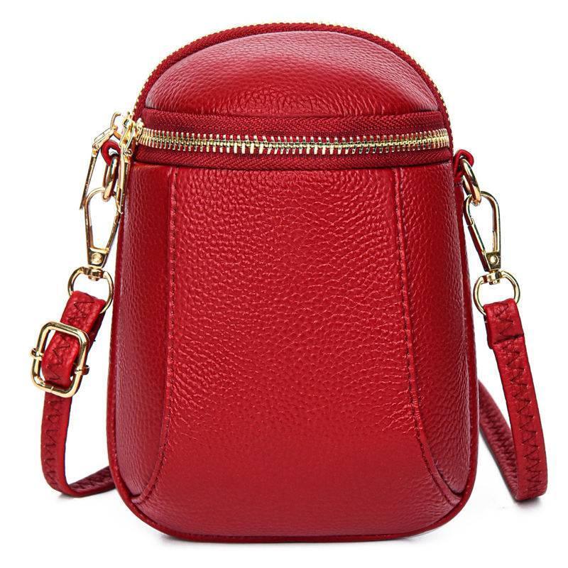 Allsidig dame crossbody veske i elegant vegansk lær. Perfekt som skulderveske.