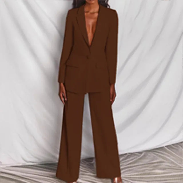Moderne dame dressett med elegant blazer og trendy vide bukser. Stilrent sett for kvinner.