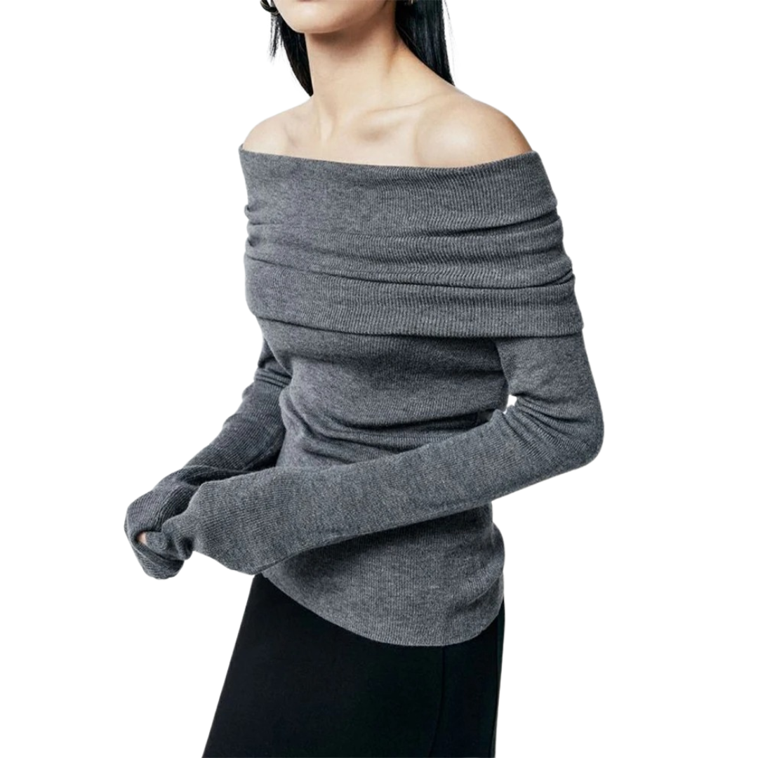 Svart off-shoulder dametopp med slash neck, langermet og elegant passform for høst og vår.