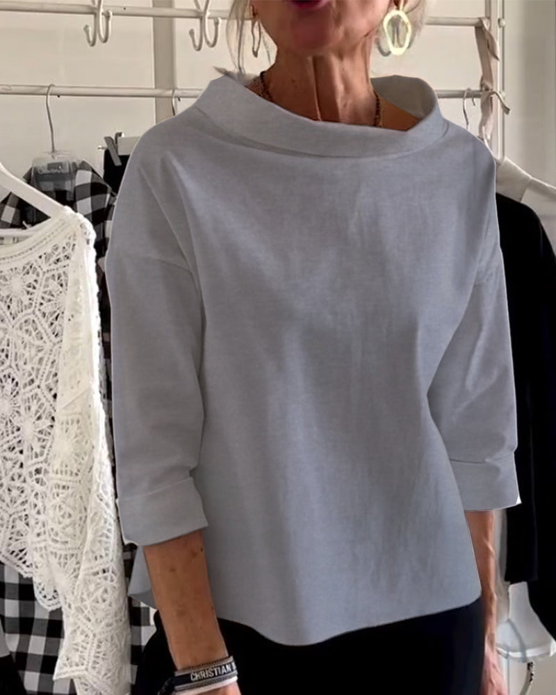 Jobbgarderobe: Elegant dame topp med høy krage, stilren og komfortabel langermet bluse.