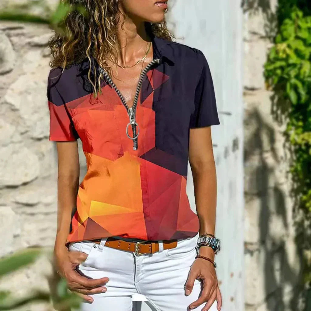 Luftig og lett damebluse i grå nyanse. Perfekt for casual og elegant sommerstil.