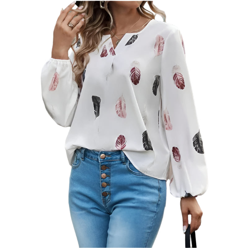 Lett vår/sommer damebluse med elegant fjærmønster. Trendy og komfortabel langermet topp for damer.