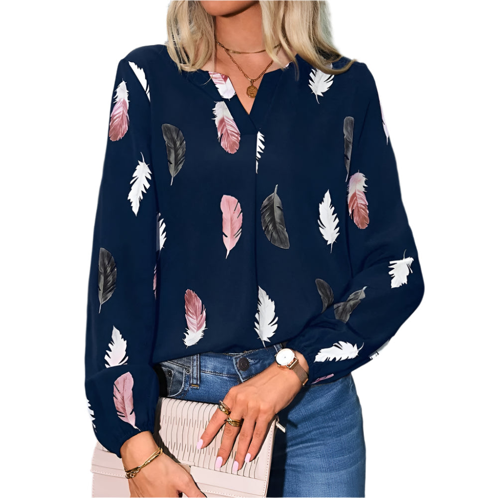 Allsidig damebluse med elegant fjærmønster, perfekt for casual og kontorbruk. En moderne topp.