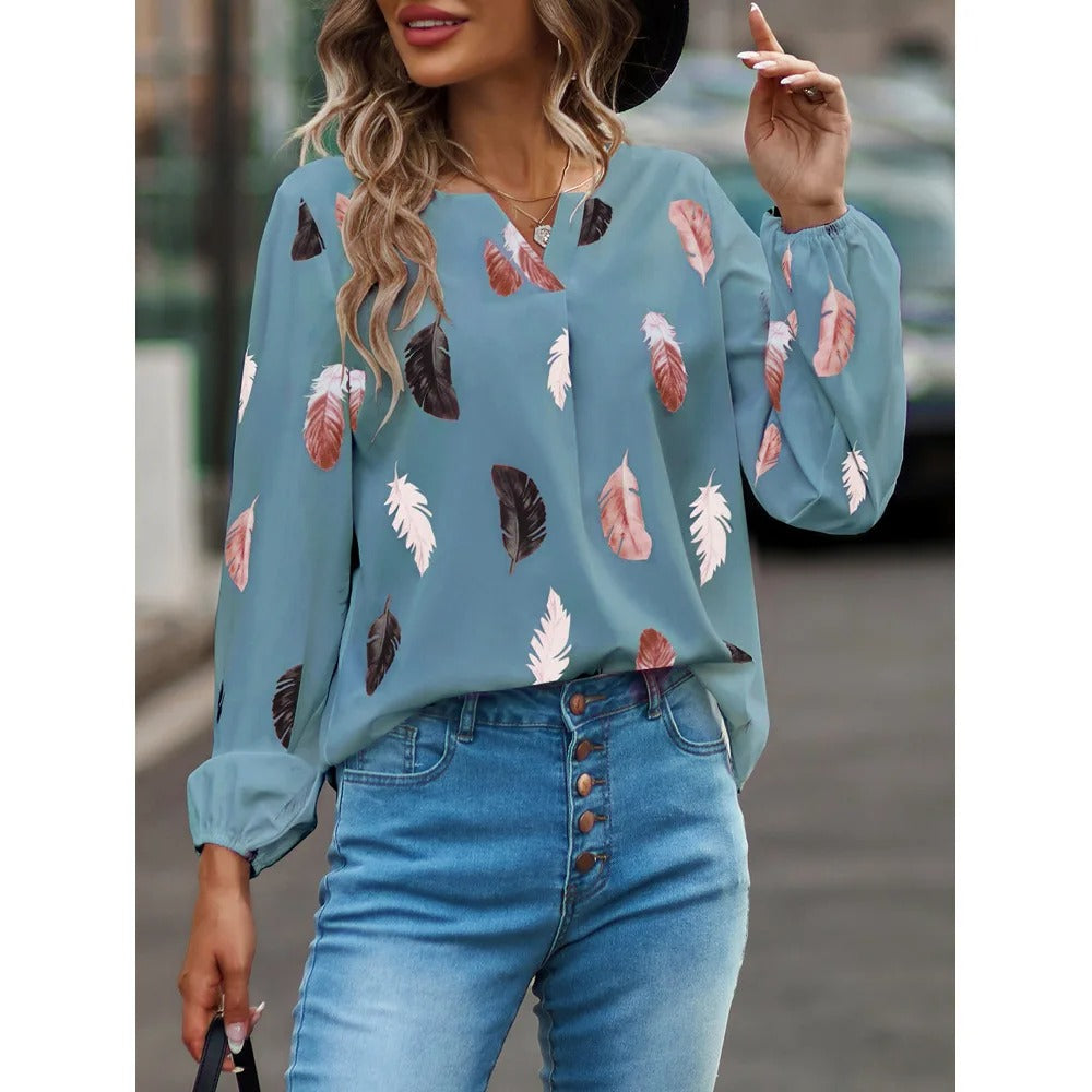 Elegant damebluse, langermet topp med unikt fjærmønster. Mote for fritid, kontor, vår og sommer.