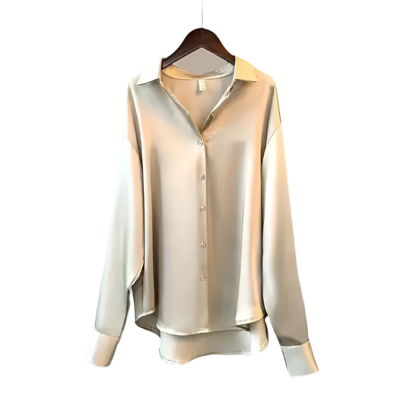 Komfortabel damebluse med knapper, elegant design fra baksiden. Klassisk og stilfull langermet bluse.