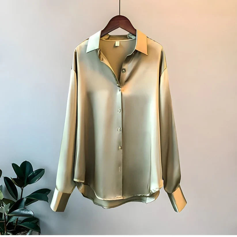 Stilren damebluse med lange ermer, ideell for et elegant hverdags- eller kontorantrekk.