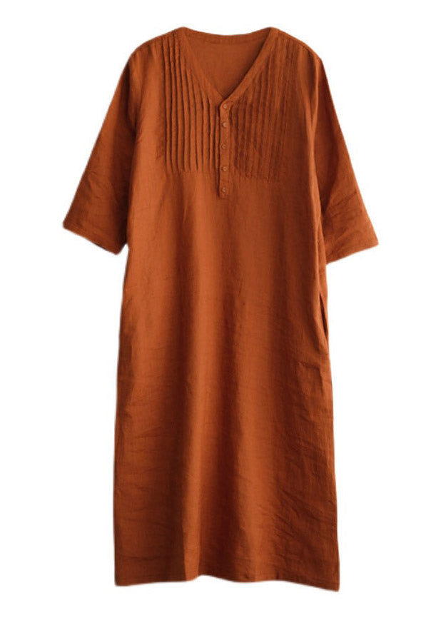 Elegant damekjole med lange ermer og løs passform. Perfekt hverdagskjole for vår og sommer.