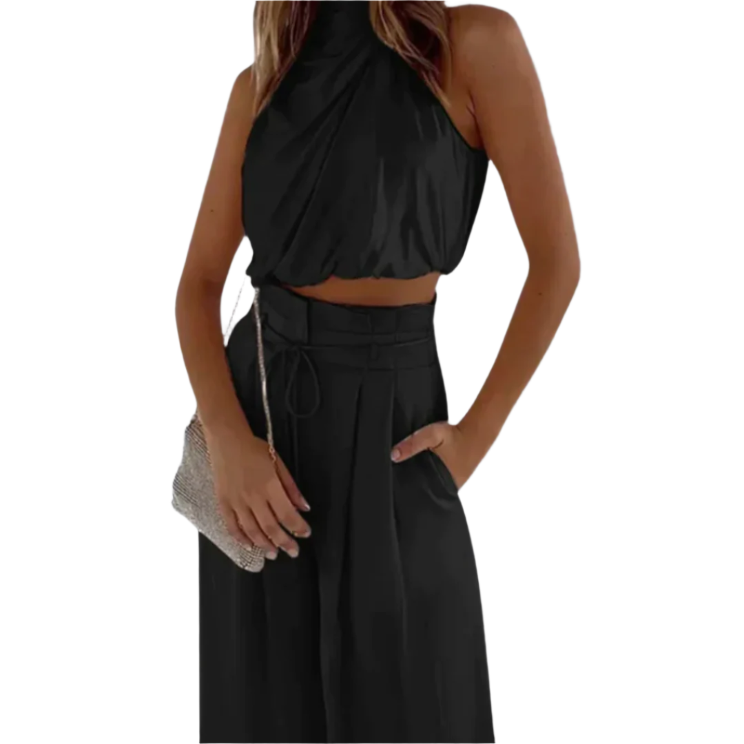 Elegant drapert to-delt sett for kvinner, med crop topp og vide bukser, perfekt for fest og sommer.