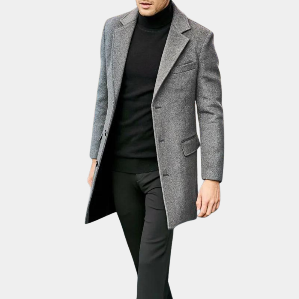 Mann i stilig, formell lang herrefrakk, elegant vinterfrakk for både formelle og uformelle anledninger.