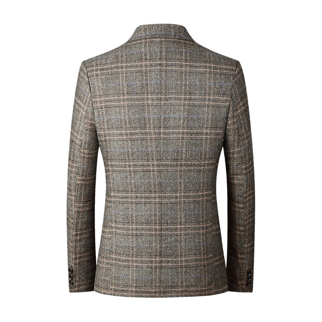 Allsidig herreblazer med elegant broderi, kan brukes formelt eller casual.
