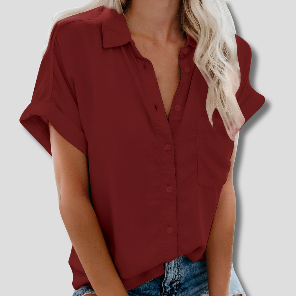 Elegant kortermet bluse for kvinner, perfekt for kontor og fritid. Stilren dameskjorte i komfortabelt stoff.