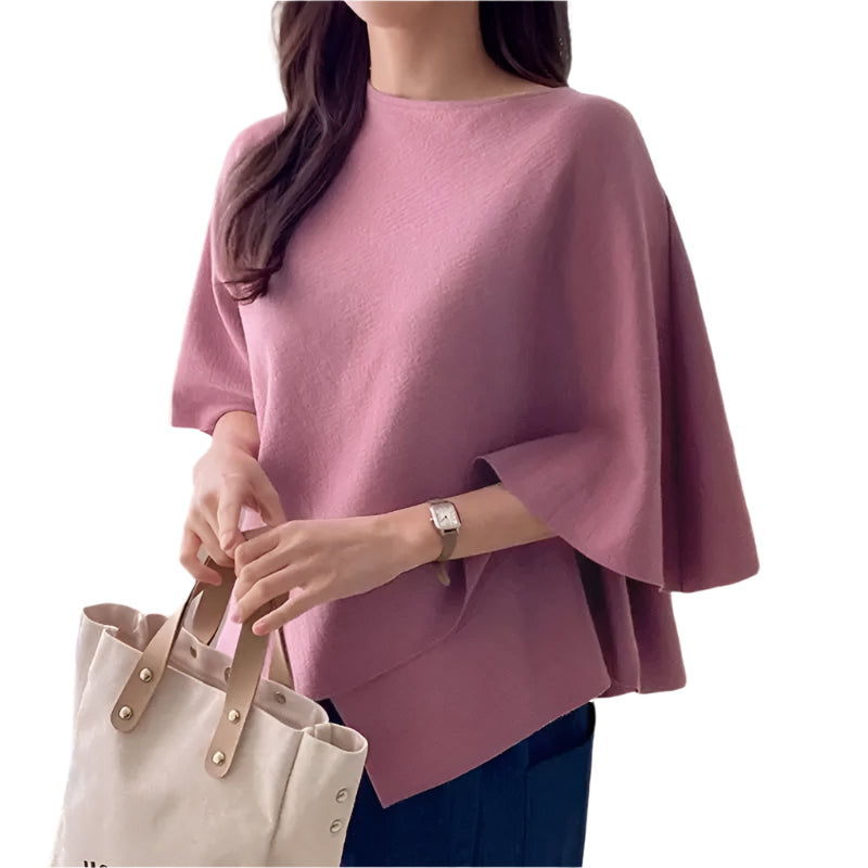Elegant kvinnebluse med 3/4-ermer og volanger, perfekt for allsidig hverdagsmote.