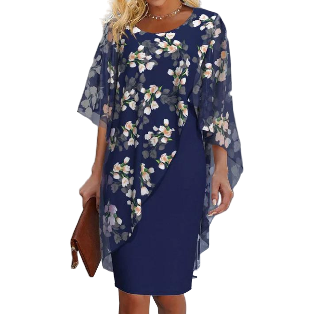 Elegant kvinnekjole med blomsterprint og korte ermer, perfekt som sommerkjole eller festkjole. Komfortabel passform.