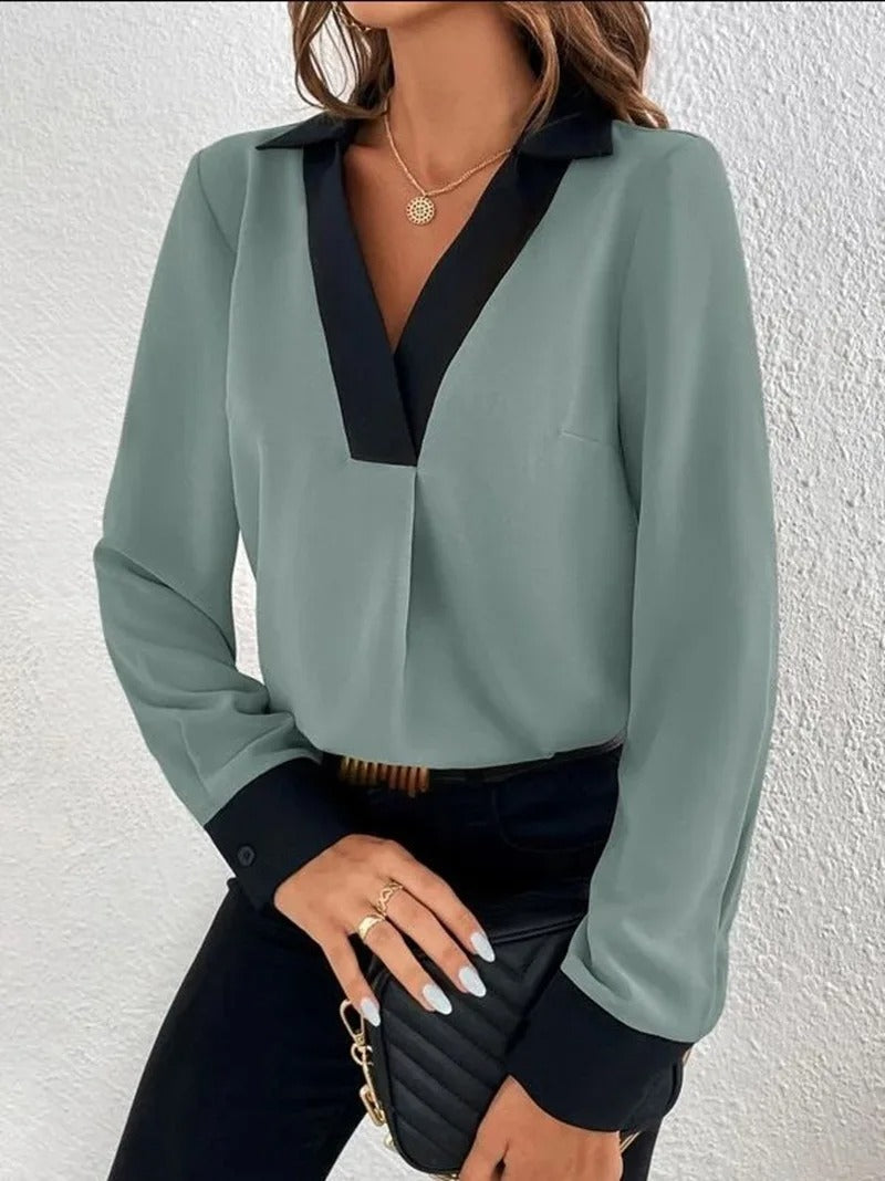 Komfortabel langermet bluse. Allsidig damebluse i elegant design, ideell for arbeidsantrekket.