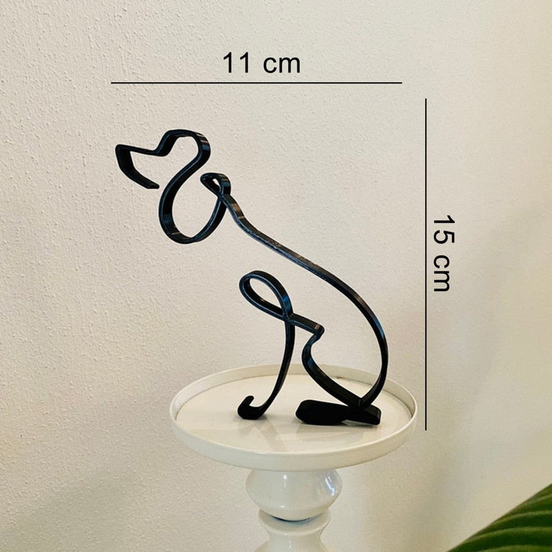 Liten metallhundeskulptur. Perfekt for minimalistisk hjemmeinnredning.