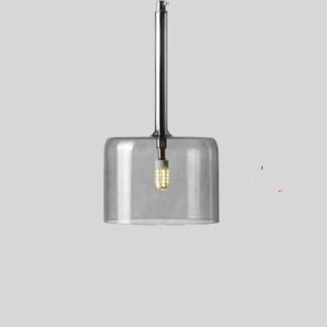 Håndblåst glasslampe, unikt design som skaper vakkert lys over spisebordet.