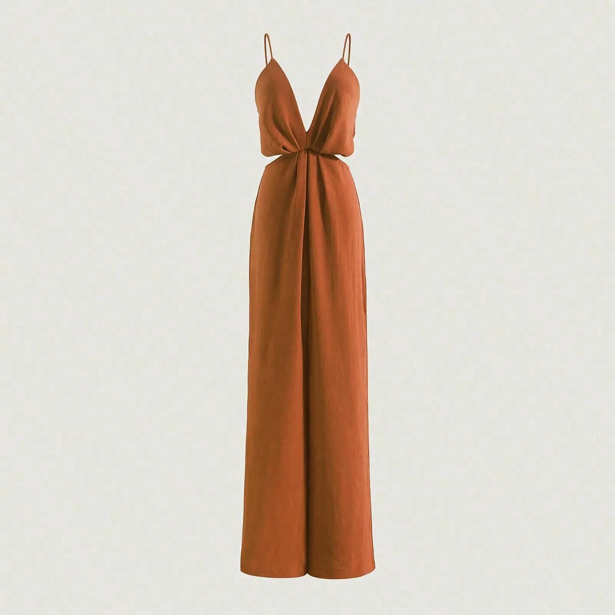 Elegant plissert jumpsuit, ideell som festantrekk for kvinner. Ryggløs detalj og vide ben.