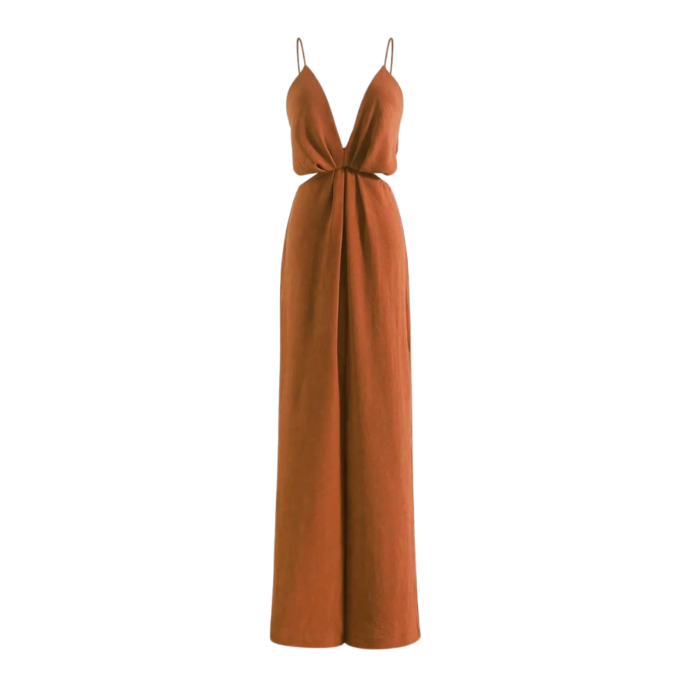 Detaljbilde av plissert tekstur på elegant jumpsuit. Myk og komfortabel kvinneklær.