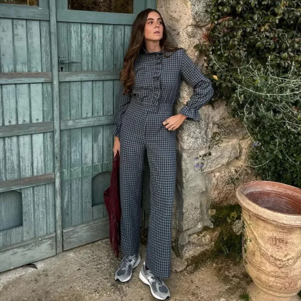 Allsidig rutete jumpsuit for kvinner med trendy bobleermer. Perfekt for elegant hverdagsbruk.