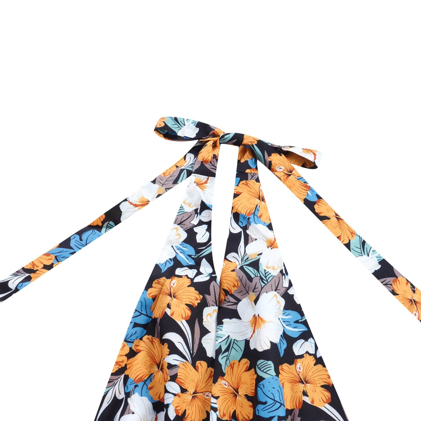 A-linje ryggløs mini solkjole i V-hals design, en elegant og luftig sommerkjole for dame.