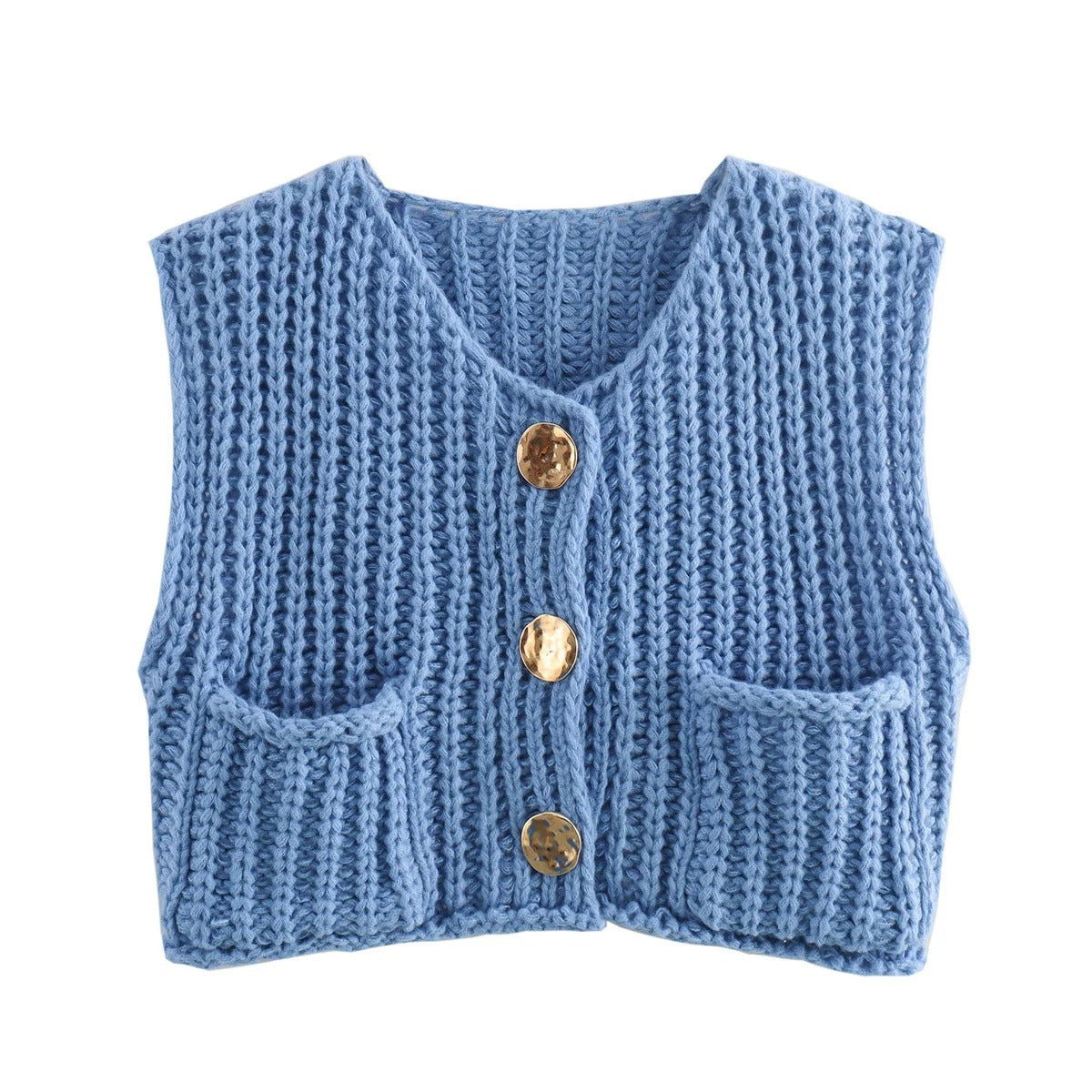Nærbilde av elegant strikkevest for kvinner med detaljerte, skinnende metallknapper. Stilfull damevest.