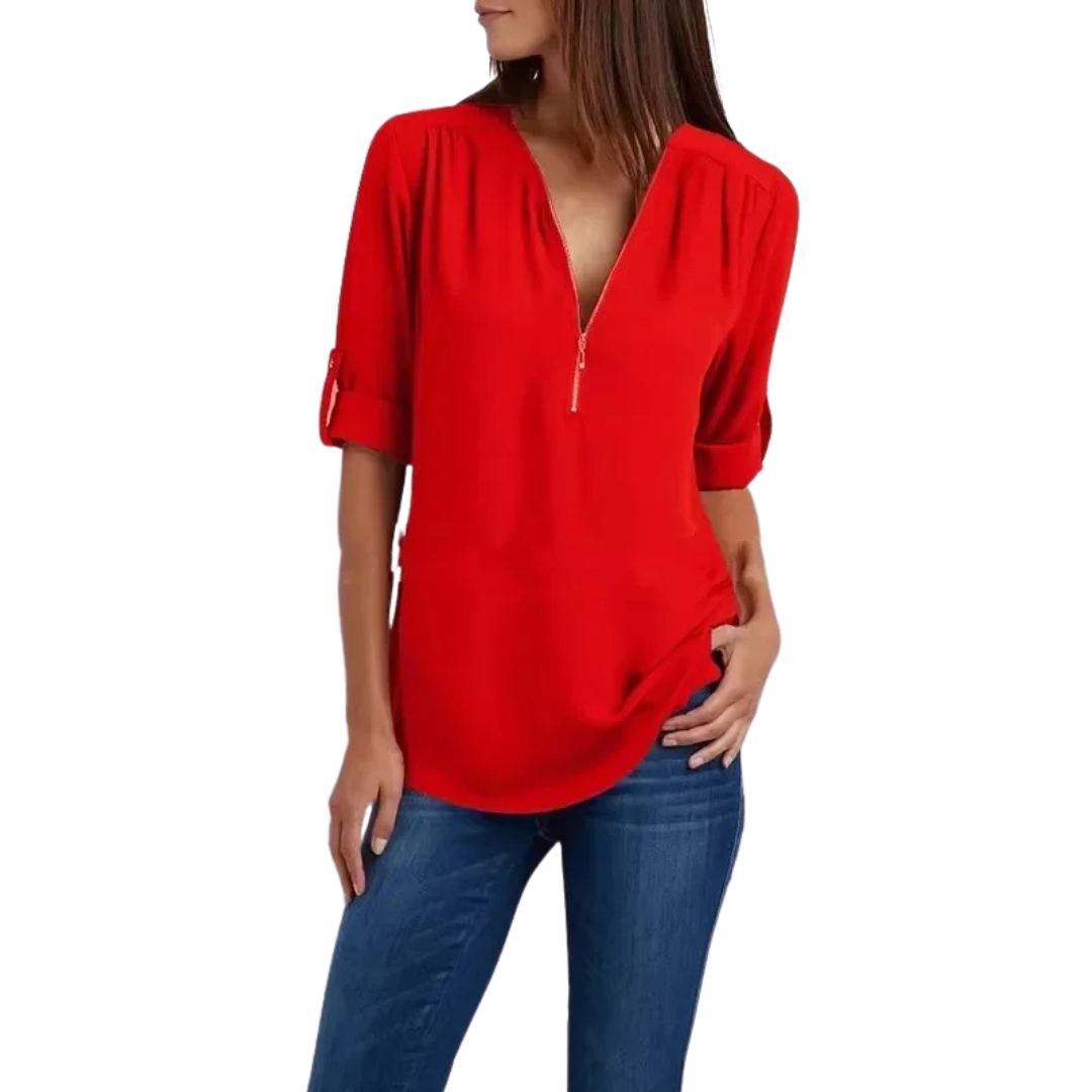 Stilig V-hals bluse for kvinner. Løs passform og elegant design, en komfortabel topp for enhver anledning.