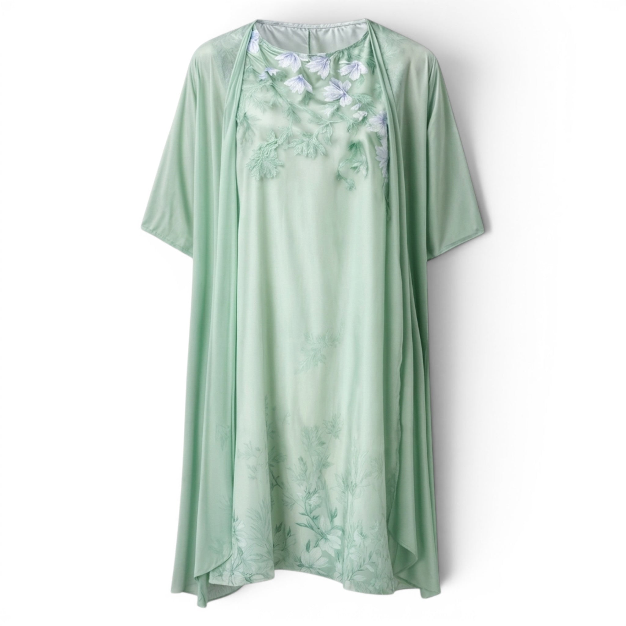 Knelang damekjole med blomster, casual men elegant, ermeløs og perfekt for vårgarderoben.