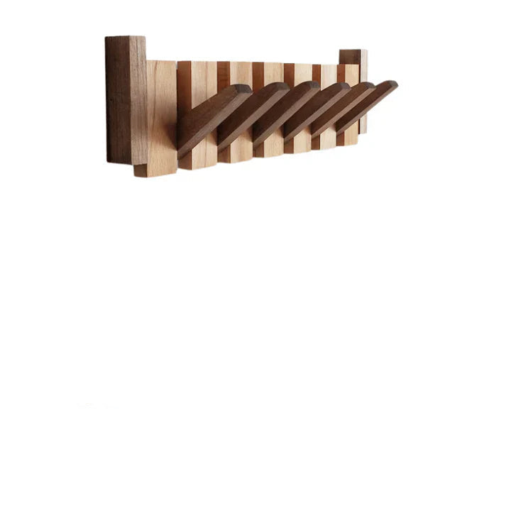 Stilig kleshenger i tre, veggmontert med kunstnerisk pianodesign. Ideell for organisert oppbevaring i gangen.