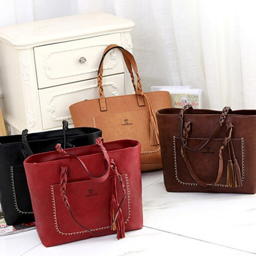 Stilvolle Damen-Schultertasche aus Kunstleder mit Flechtgriffen, ein Must-have für jede modebewusste Frau.