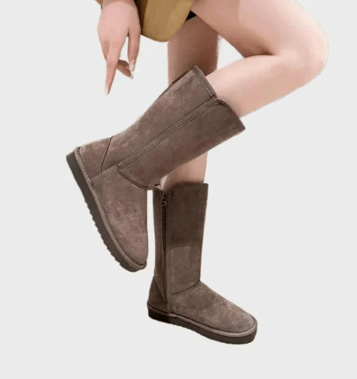 Stilfulle brune kvinneboots for vinter. Elegante og holdbare damestøvler med varmt fôr for maksimal komfort.