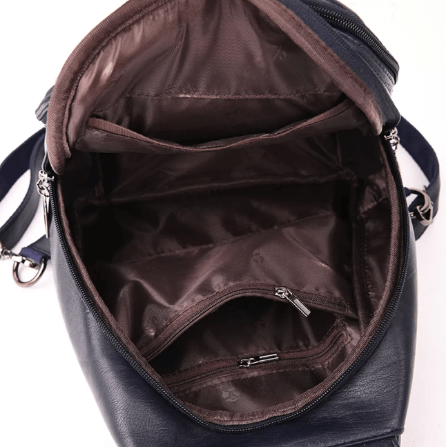 Detail der metallenen Hardware an einem Damen Lederrucksack, glänzend und robust, stilvolle Tasche