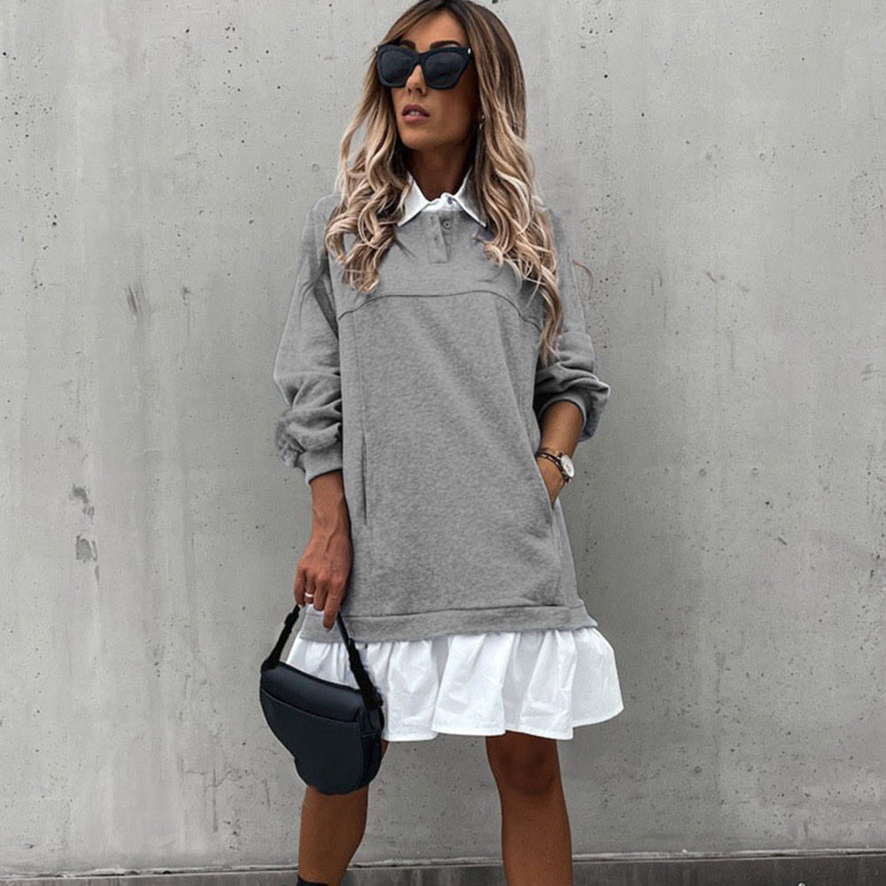 Herbstliches Damenkleid mit Kragen und langen Ärmeln, schlichtes Design, bequem und stilvoll.