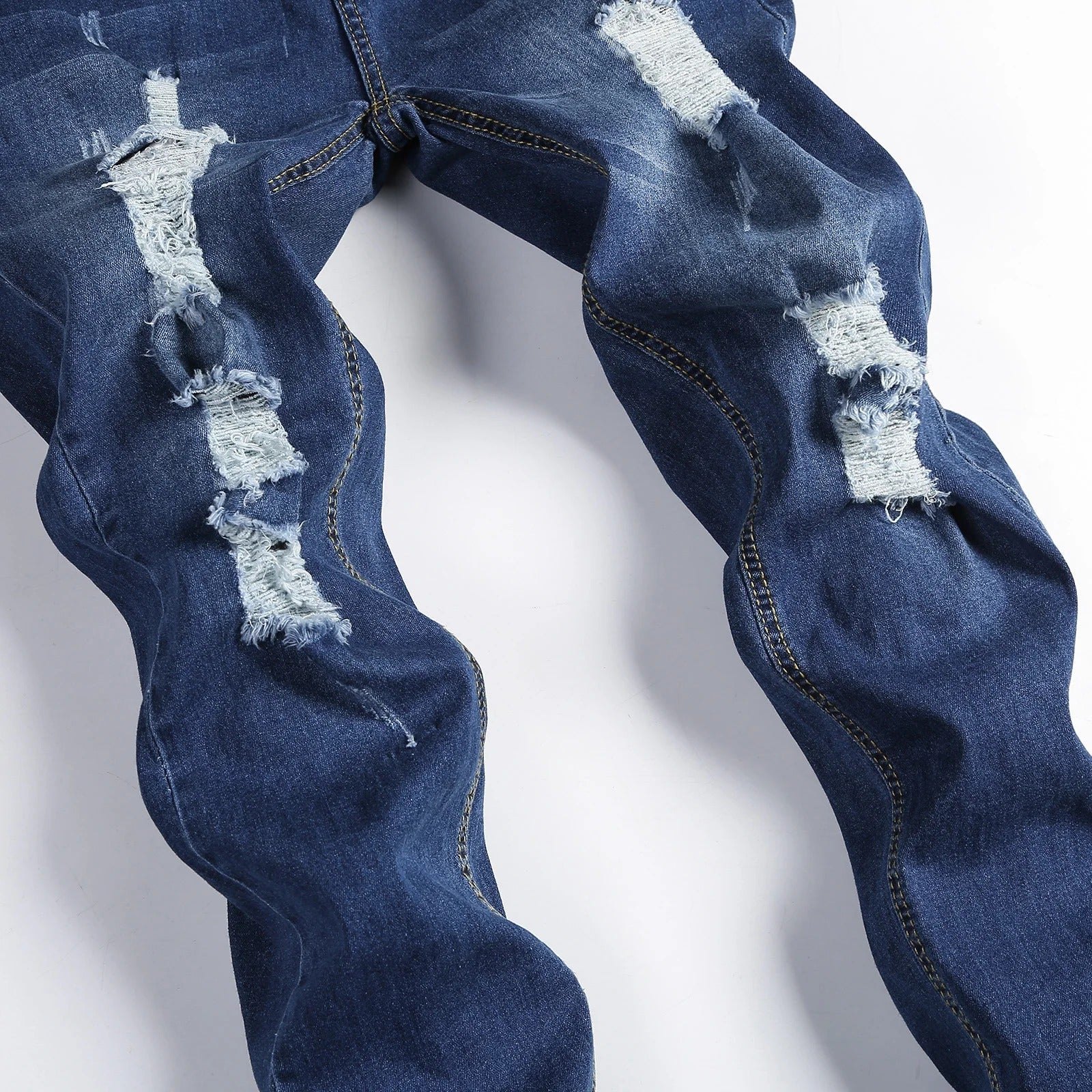 Blågrå jeans med slitasjemerker for menn, med smal passform og komfortabel stretch