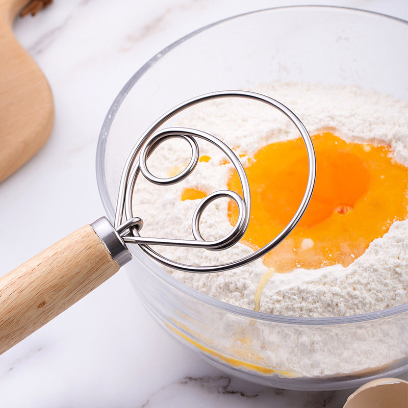 Komfortabel ergonomisk håndvisp i stål; perfekt kjøkkenutstyr for håndbaking.