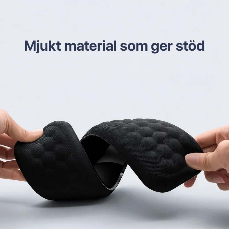 Myk, ergonomisk håndleddsstøtte i memoryfoam for optimal komfort ved langvarig PC-bruk.