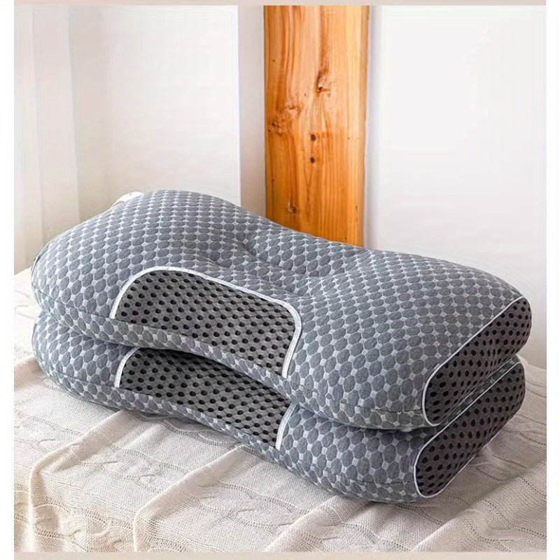 Denne grå, vaskbare ergonomiske puten tilbyr perfekt støtte for både nakke og hodet under søvn.