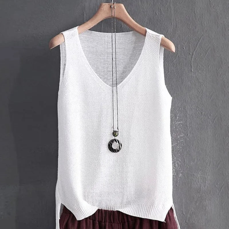 Trendy ermeløs strikket damebluse med V-hals, en must-have for vårens garderobe.
