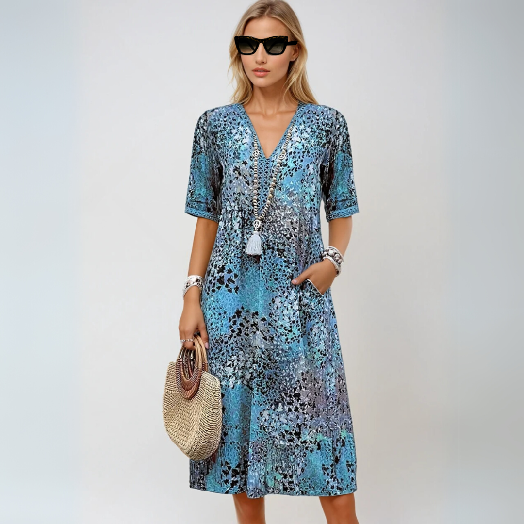Elegant boho midikjole for kvinner, løs passform og fargerikt design, en stilig sommer- og festkjole.