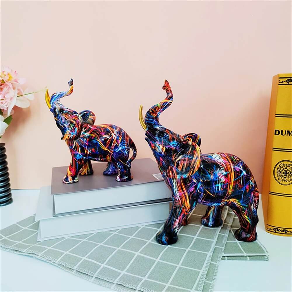 Abstrakt graffiti elefantstatue i lyse farger, unik kunst for et moderne hjem.