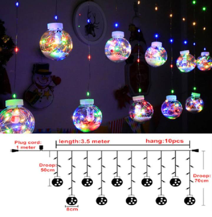 Energieffektive LED-kulelys i festlig juledekorasjon. Varme hvite og lilla nyanser med fjernkontroll.