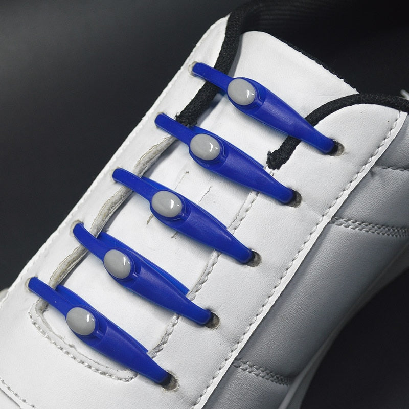 Elastiske sportsskolisser i silikon, med no-tie design for optimal komfort og brukervennlighet.