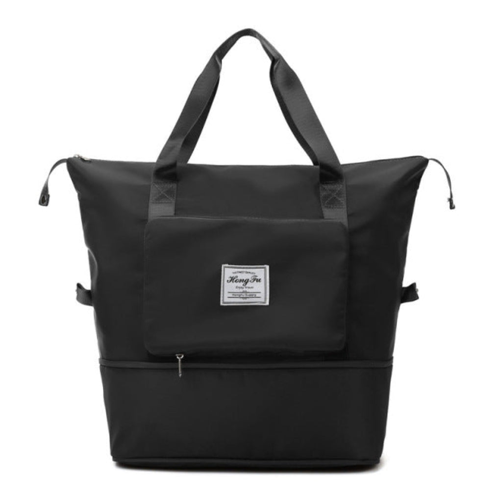 Lettvekt dufflebag i slitesterk nylon, perfekt for reise, trening og oppbevaring. Unisex foldbar håndbagasje.