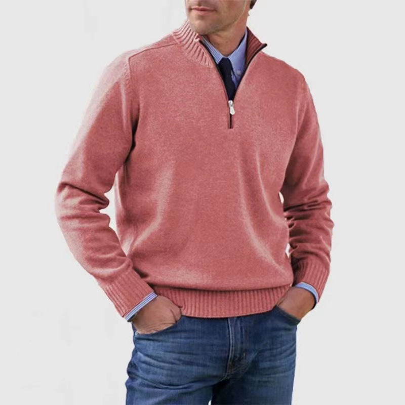 Detaljvisning av kvalitetsglidelås og strikkemønster på herregenser.
